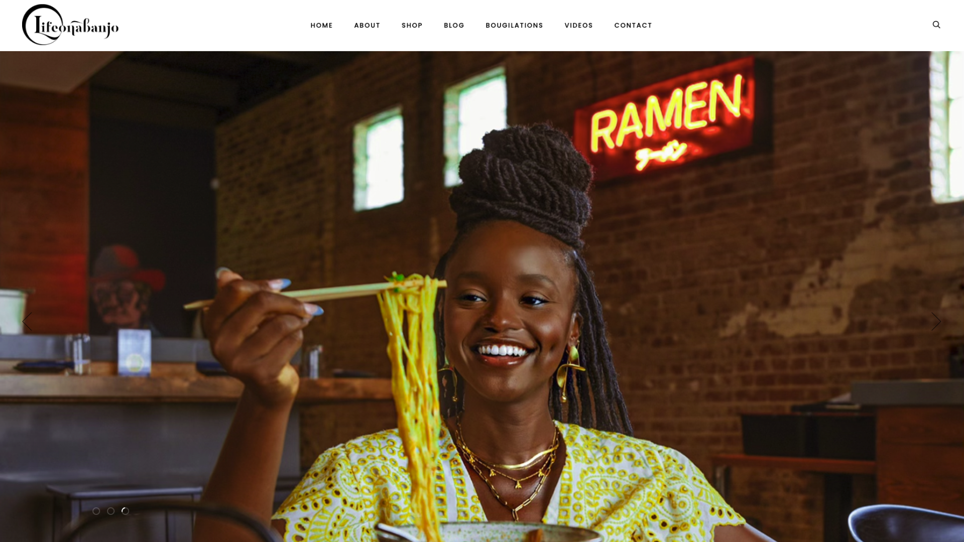 Laoluonabanjo website landing page showing her eating ramen noodles